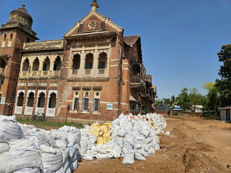 Indumati Palace Residences Vadodara construction update April 2026 - materials on site beneath the restored palace facade